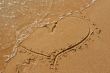 heart drawn in the sand