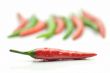 Multi-colored peppers on a white background