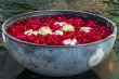 Rose petals, lotos ans plumeria flowers in the bowl