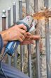 Worker hands with grinder
