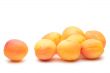 Juicy apricots on a white background
