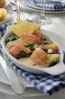 Salmon with potatoes and spinach cream sauce