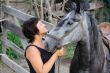Portrait happy smiling woman with horse