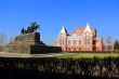 Landscape with historic theater and blue sky