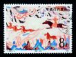 A stamp printed in China shows Chinese ancient wall painting art