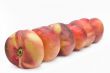 Fig peaches on a white background