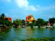 Lake With Buildings In Backgrond