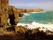Rocky Shore And Breaking Waves