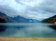 Perfectly Still Lake By Mountains 