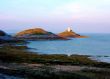 Lighthouse On The Rocks