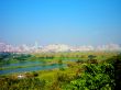 Lakes With City Skyline In Background