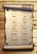 Calendar 2013 Scroll of old paper on wooden boards    