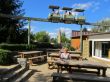 Woman relaxing in a cafe in the park "Turopark"