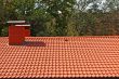 The roof is covered with red tiles   