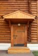 Entrance into a wooden house 