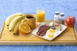 image of breakfast on wooden plank