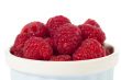 a bowl with red raspberries