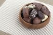 assorted chocolate in wooden bowl