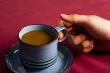 holding coffee