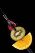 fruits in stick with chocolate dip