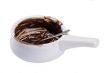 empty chocolate sauce dish
