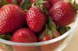 close up shot of strawberries in bowl