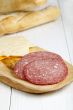 garnishing a ham sandwich