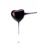 heart shaped coated with chocolate syrup