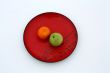 Apple and mandarin on a plate