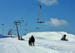 skiers on the lift