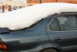 Snow on the roof of the car
