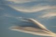 Diagonal clouds on blue sky