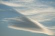 Diagonal clouds on blue sky