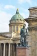 Monument on the background of the Kazan Cathedral