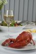 dinner table with lobster and wine
