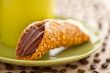 close up image of a pastry in saucer