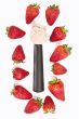 scoop with ice cream surrounded with strawberries