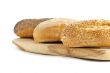 cropped image of breads on the wooden plank 