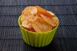 cheese flavored potato chips in green bowl