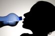 thirsty female drinking water