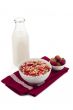 strawberries and milk on the cereals