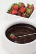 strawberries and chocolate syrup
