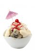 banana split sundae on a white bowl