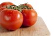fresh tomato in wooden plate