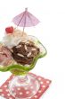 a cup with a scoop of ice cream