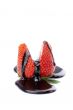 sliced strawberry with melted chocolate