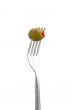  olive fruit on fork