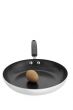 brown egg in frying pan