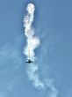 Perform aerobatics by the aircraft at the airshow