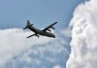 Russian transport airplane in the summer sky